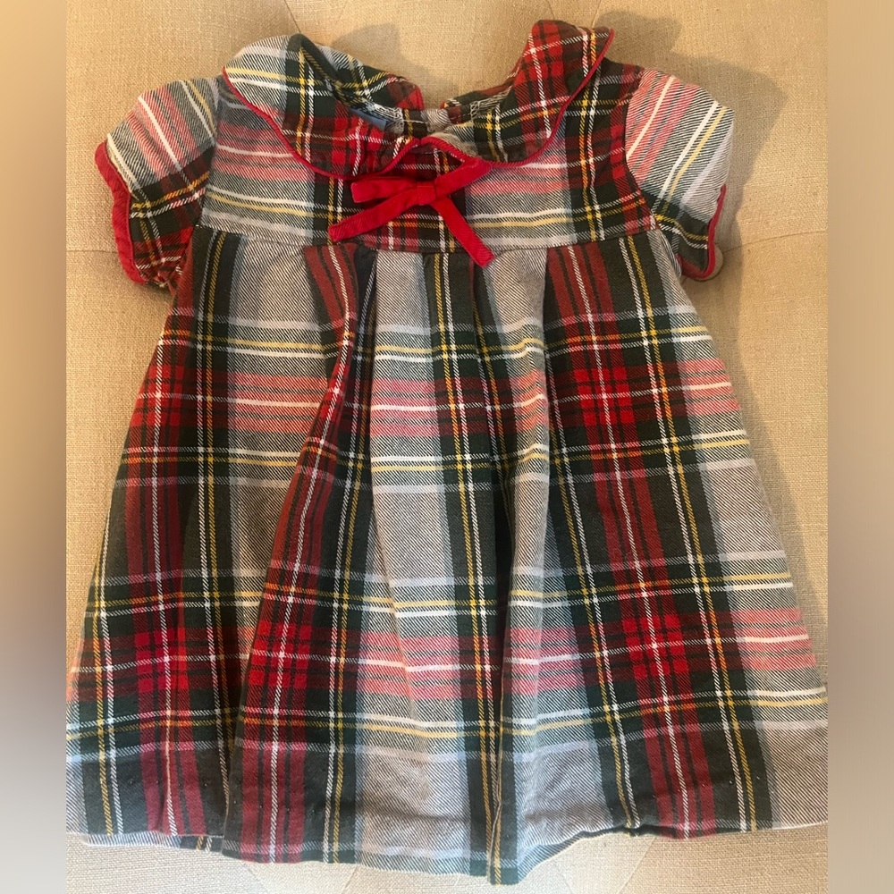 Adorable puff sleeves, sweet plaid & corduroy trim & bow on this favorite dress.